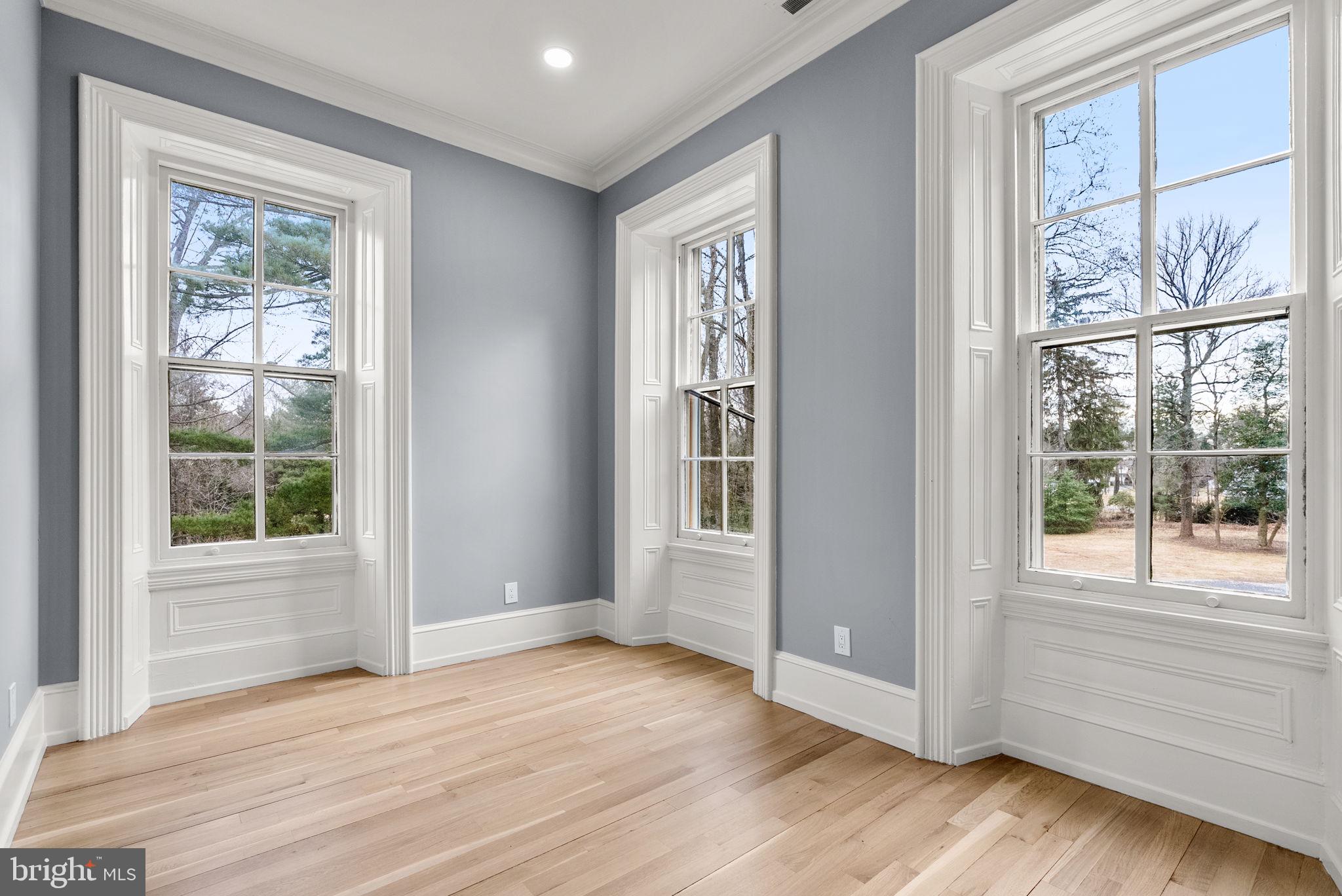 231 Woodlane Road Edgewater Park, NJ 08010 - Photo 50 of 95 a view of an empty room with wooden floor and a window
