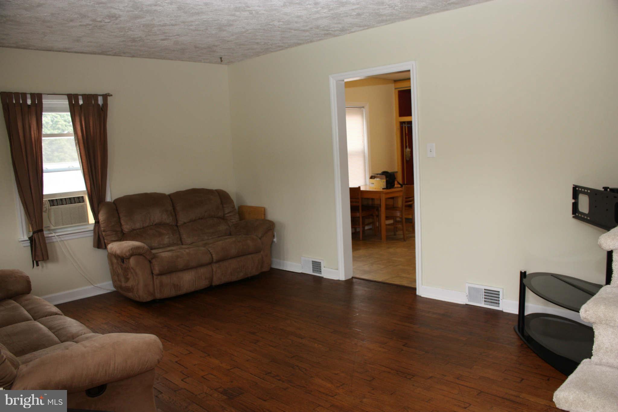 5707 Shookstown Road Frederick, MD 21702 - Photo 13 of 22 a living room with furniture and a window