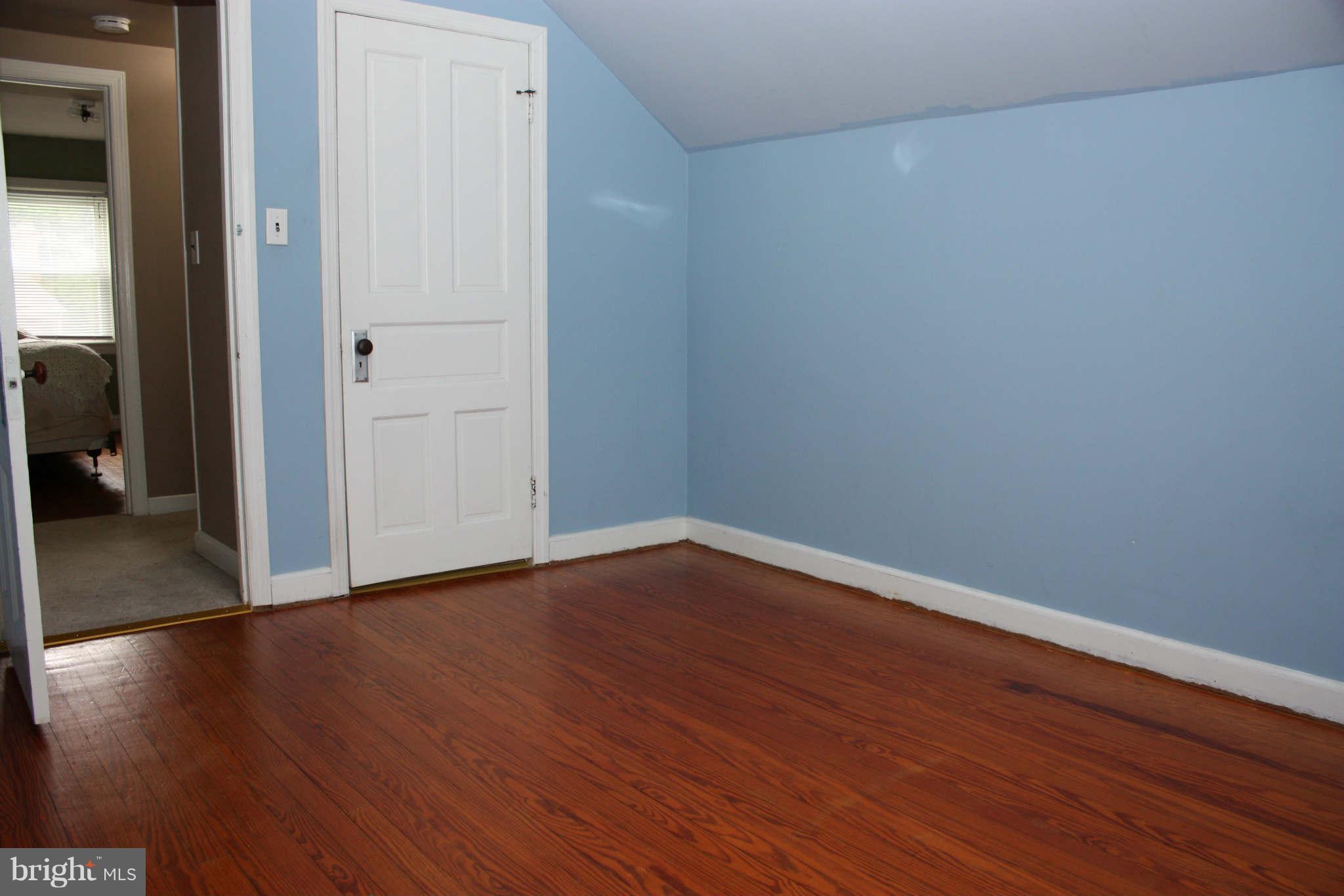 5707 Shookstown Road Frederick, MD 21702 - Photo 17 of 22 a view of a room with wooden floor