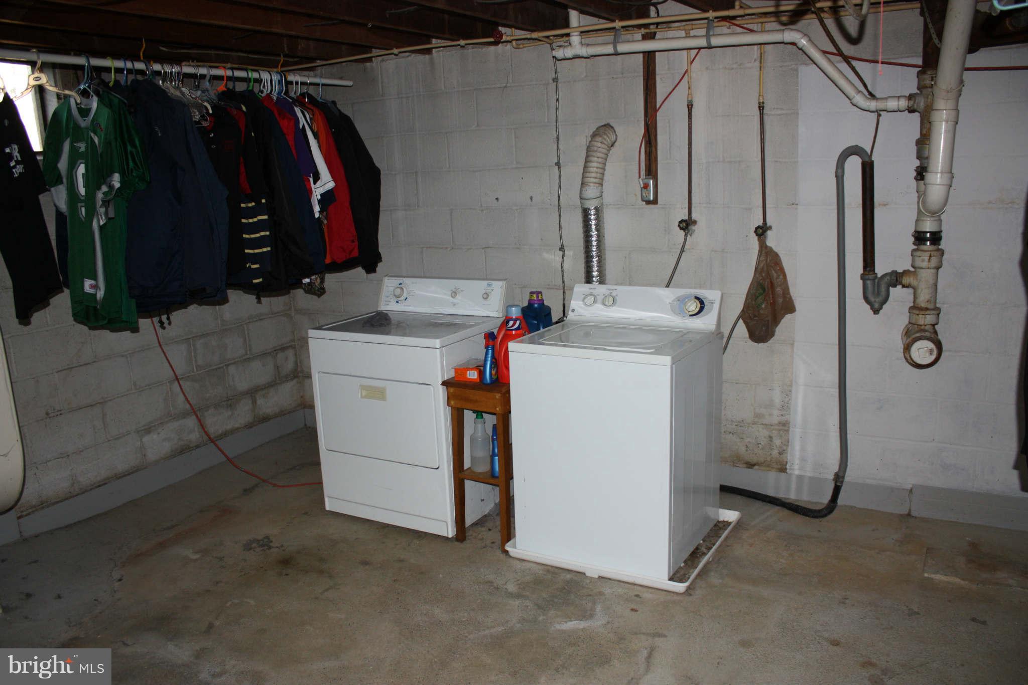 5707 Shookstown Road Frederick, MD 21702 - Photo 22 of 22 a utility room with dryer and washer