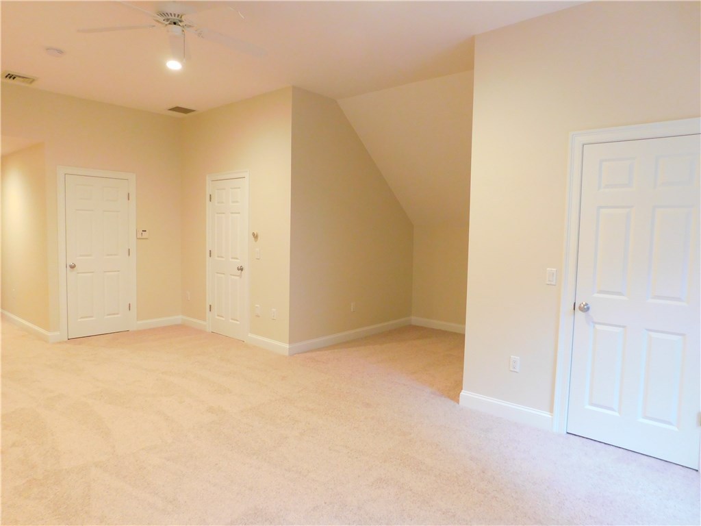 120 Arcadia Road Hopkinton, RI 02832 - Photo 24 of 36 Master bedroom showing his/her closets and walk up attic access