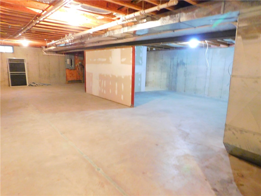120 Arcadia Road Hopkinton, RI 02832 - Photo 33 of 36 The unfinished basement has 2 access staircases. One is through the 2 car garage and the other is from the interior of the house.