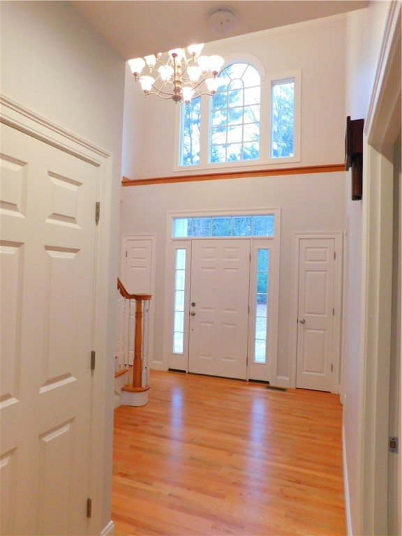 120 Arcadia Road Hopkinton, RI 02832 - Photo 8 of 36 Grand foyer, with display area over entry