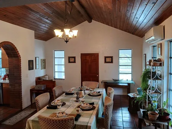 a kitchen with a sink and large window
