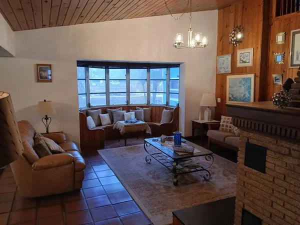 a kitchen with a sink and a refrigerator