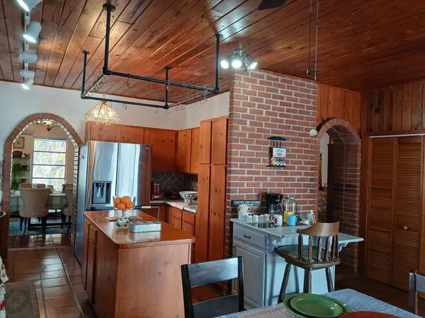 a view of a porch with furniture