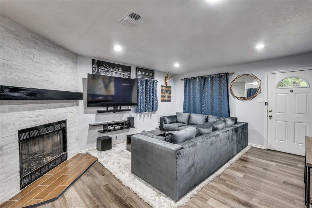15309 Flud Road Kemp, TX 75143 - Photo 1 of 1 a living room with furniture and a flat screen tv