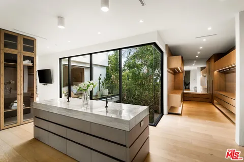 a view living room with furniture and flat screen tv