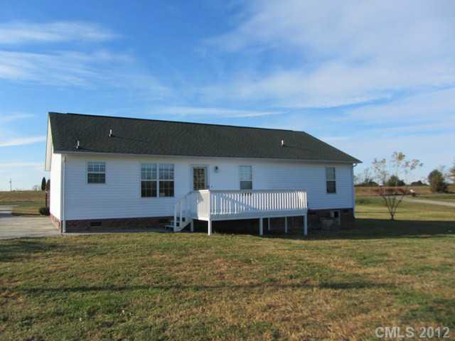 476 Owens Road York, SC 29745 - Photo 2 of 12 a front view of a house with a garden