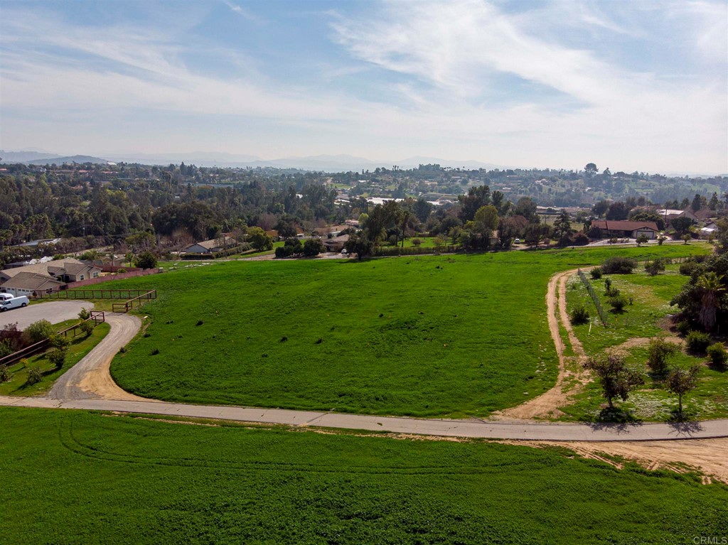 6 Grey Rabbit Hollow Lane Fallbrook, CA 92028 - Photo 1 of 1 a view of a golf course with a lake