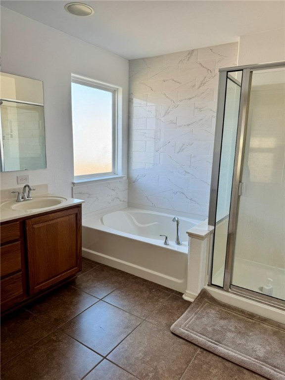 2106 Halcon Street Corpus Christi, TX 78414 - Photo 12 of 23 a bathroom with a tub sink and mirror