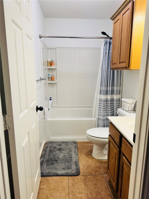 2106 Halcon Street Corpus Christi, TX 78414 - Photo 16 of 23 a bathroom with a sink a toilet and shower