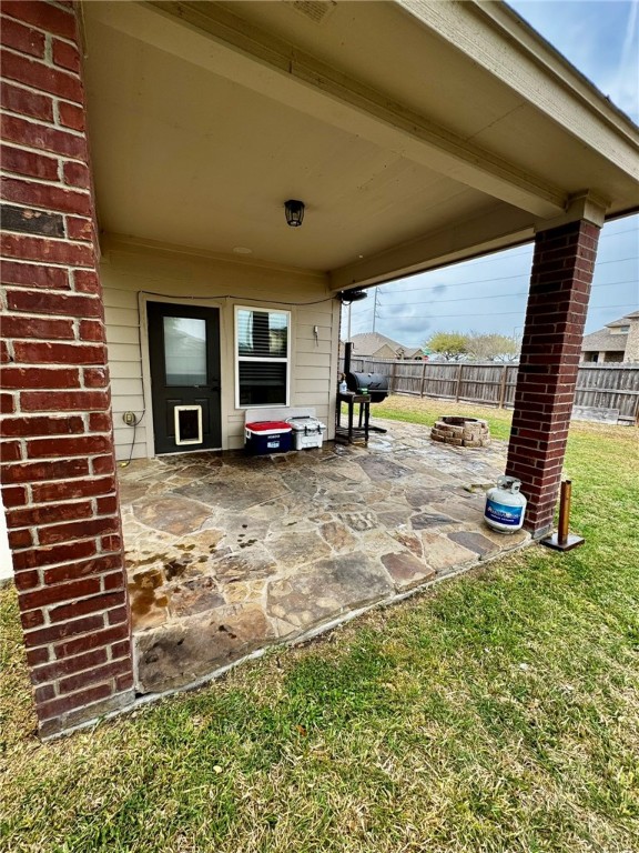 2106 Halcon Street Corpus Christi, TX 78414 - Photo 18 of 23 a view of a porch with two chairs and a fireplace