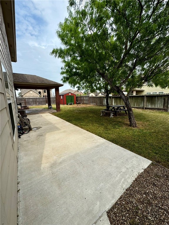2106 Halcon Street Corpus Christi, TX 78414 - Photo 20 of 23 a view of a patio with a yard