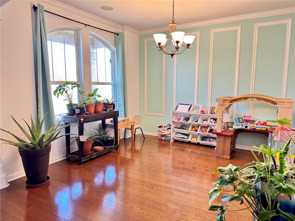 2106 Halcon Street Corpus Christi, TX 78414 - Photo 6 of 23 a living room with furniture and a chandelier