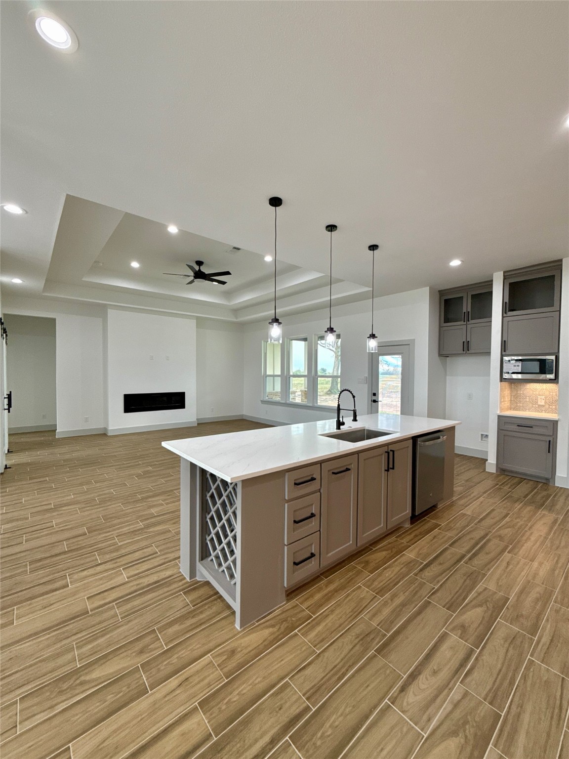 931 Buffalo Trail Angleton, TX 77515 - Photo 7 of 20 a large kitchen with stainless steel appliances granite countertop a large counter top a stove a sink and a refrigerator