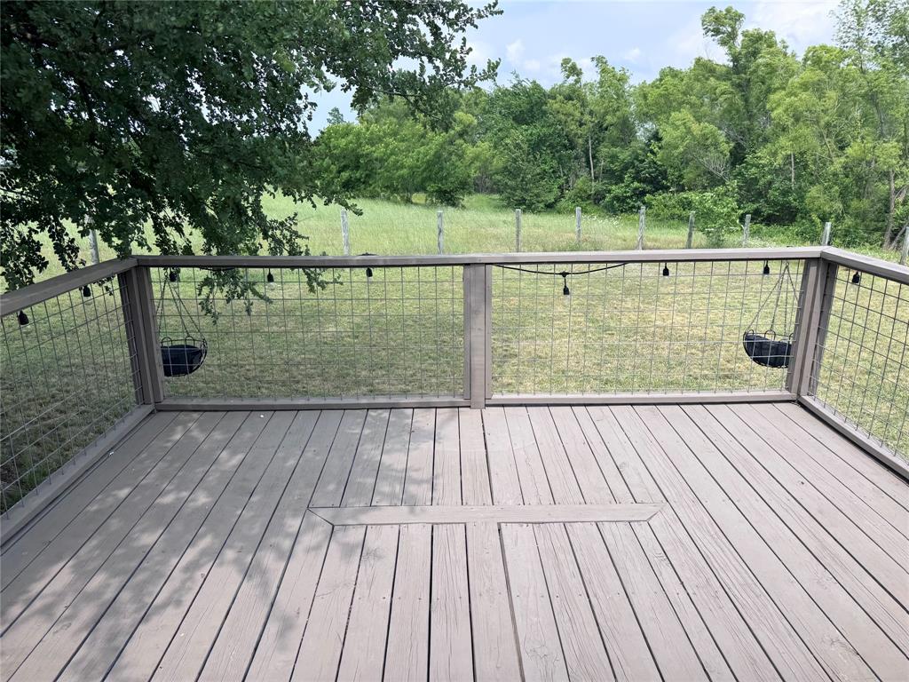 7268 Brangus Road Anna, TX 75409 - Photo 4 of 21 a view of outdoor space with deck and trees