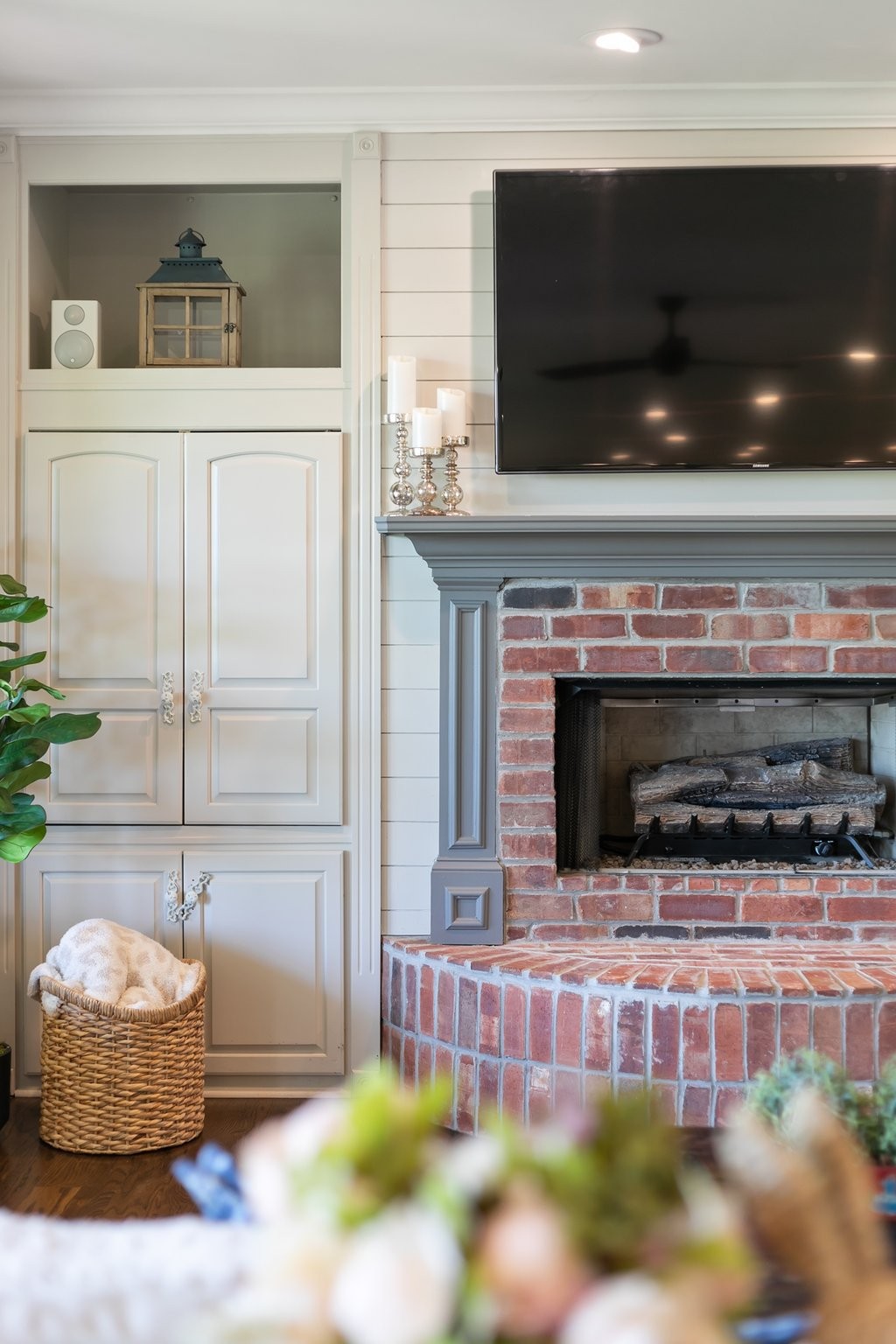 4360 Arno Road Franklin, TN 37064 - Photo 12 of 24 a living room with a fireplace and a flat screen tv