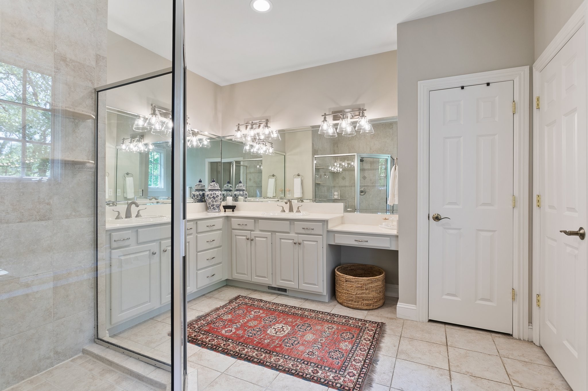 4360 Arno Road Franklin, TN 37064 - Photo 14 of 24 a bathroom with a double vanity sink and mirror