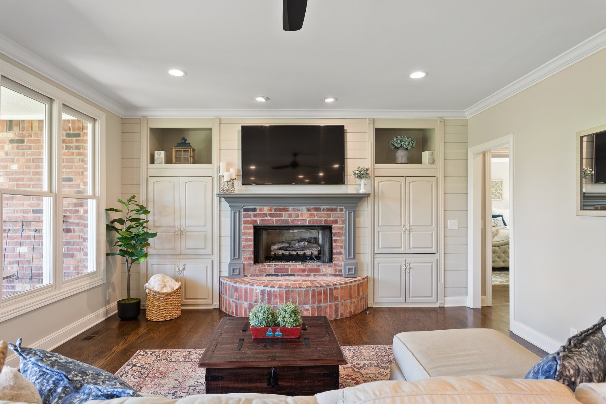 4360 Arno Road Franklin, TN 37064 - Photo 9 of 24 a living room with furniture and a fireplace