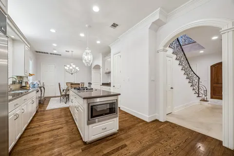 a kitchen with a stove and a sink
