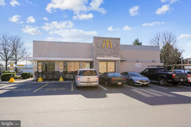 a view of a street with cars