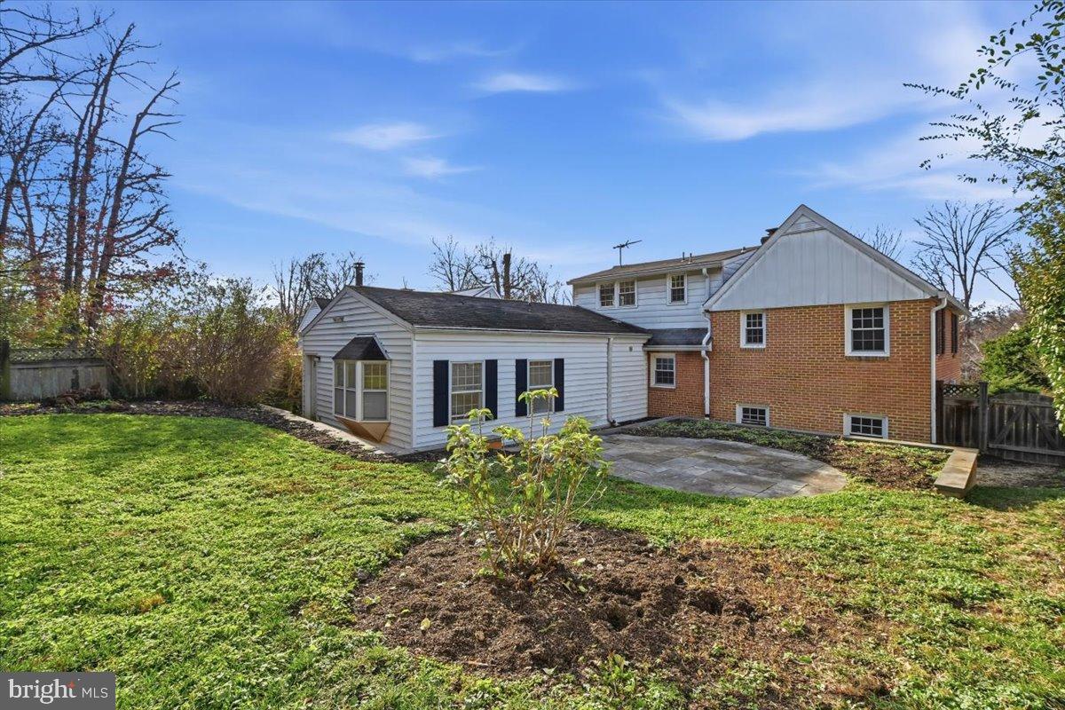 47 Fort Williams Parkway Alexandria, VA 22304 - Photo 13 of 19 Charming backyard retreat with lush greenery.