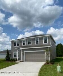 1094 Victoria Hills Jacksonville, FL 32221 - Photo 1 of 15 a front view of a house with a yard