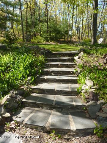 6379 B Five Springs Road Stroudsburg, PA 18360 - Photo 20 of 39 Flagstone Sidewalk Leading to Yard