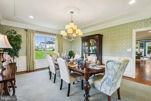 a living room with furniture a window and appliances