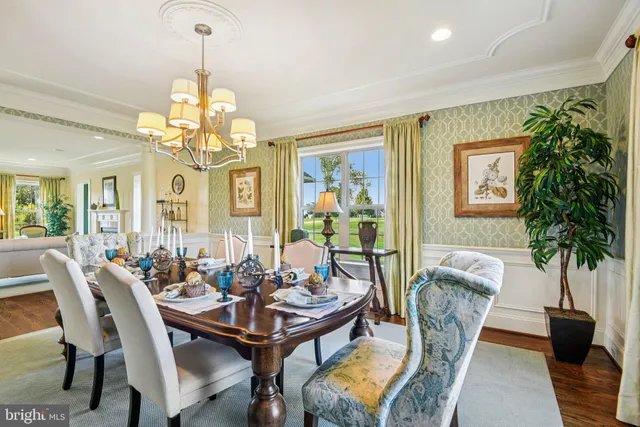a kitchen with stainless steel appliances granite countertop a stove and refrigerator