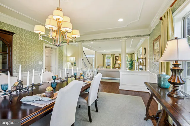 a open kitchen view with stainless steel appliances granite countertop a stove oven and a refrigerator with cabinets