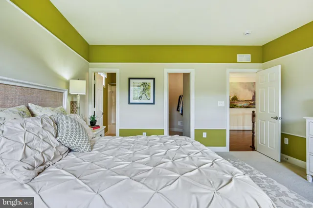 a view of living room kitchen and dining room