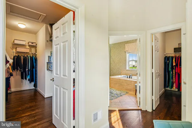 a aerial view of a house with a yard table and chairs