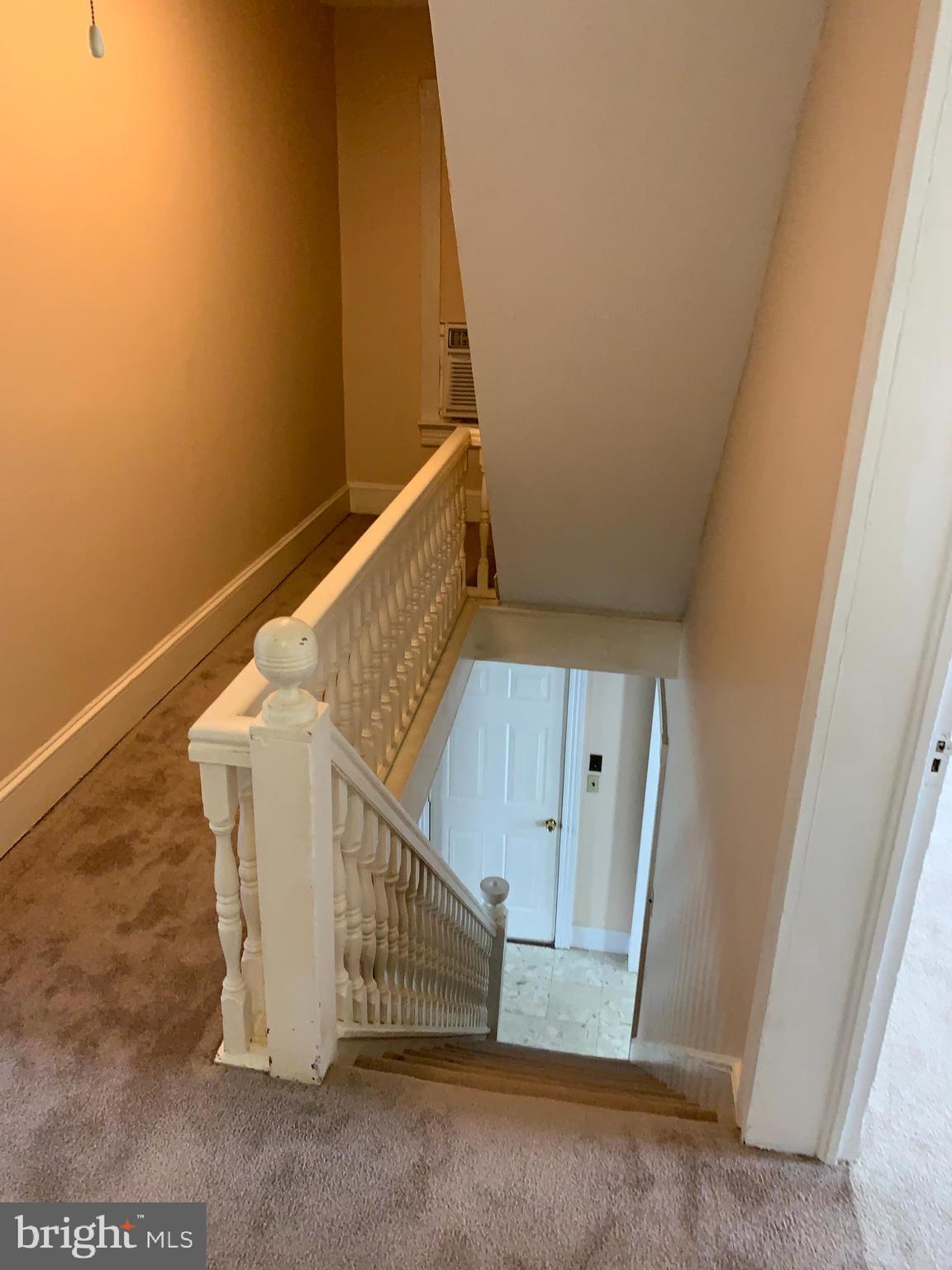2450 Boteler Road Brownsville, MD 21715 - Photo 22 of 46 Upstairs to hall to attic for stoage