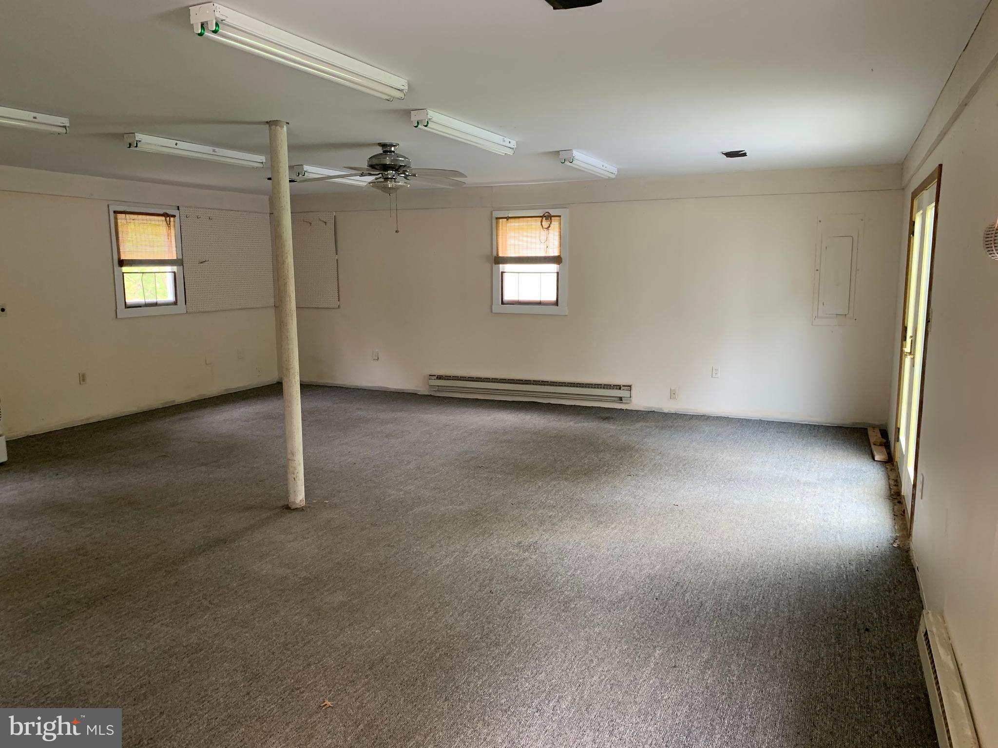2450 Boteler Road Brownsville, MD 21715 - Photo 41 of 46 Large work room in garage 1st level
