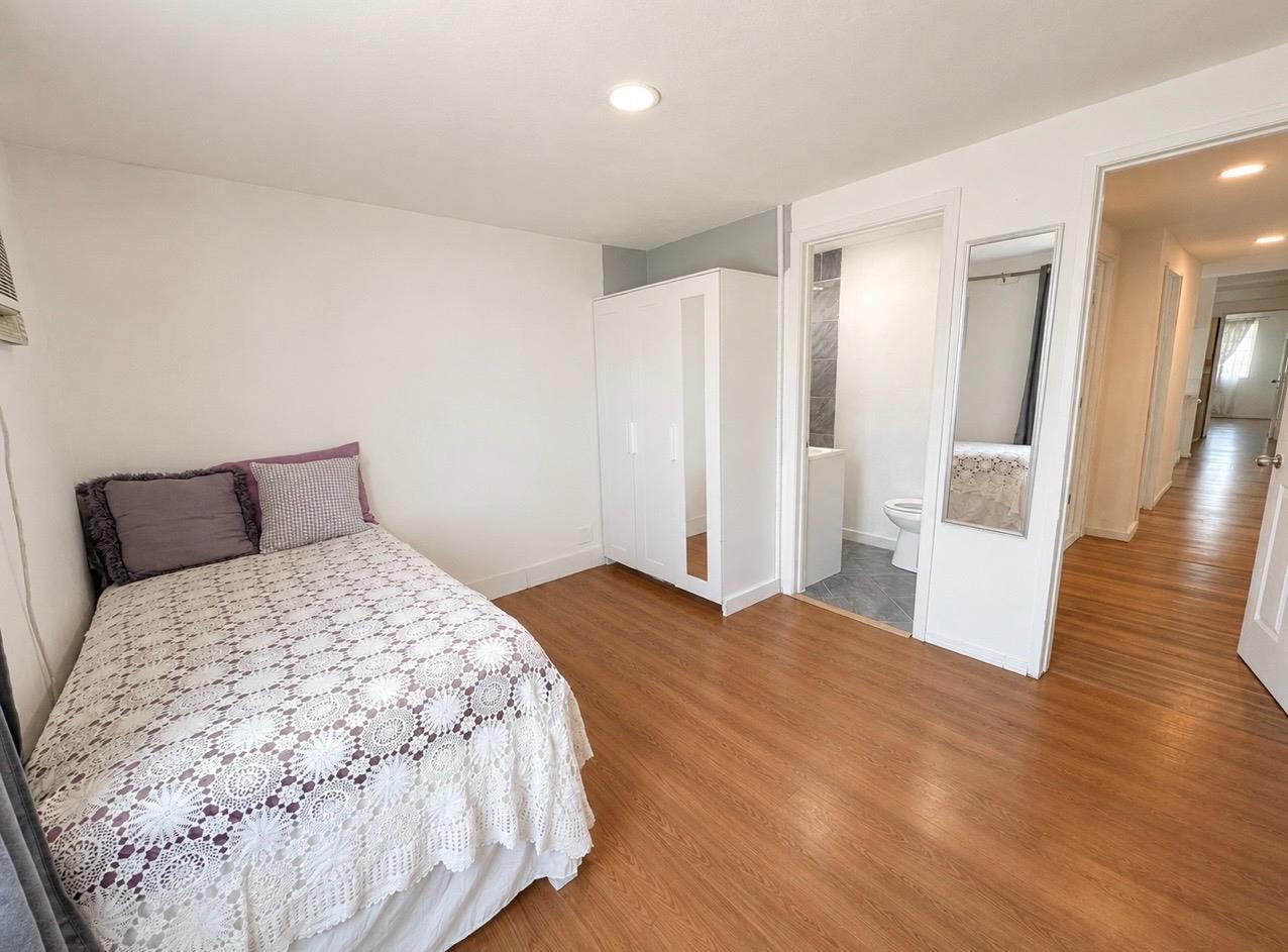 5000 Pierce Road, Unit 32 Bakersfield, CA 93308 - Photo 9 of 15 a bedroom with a bed and a large mirror