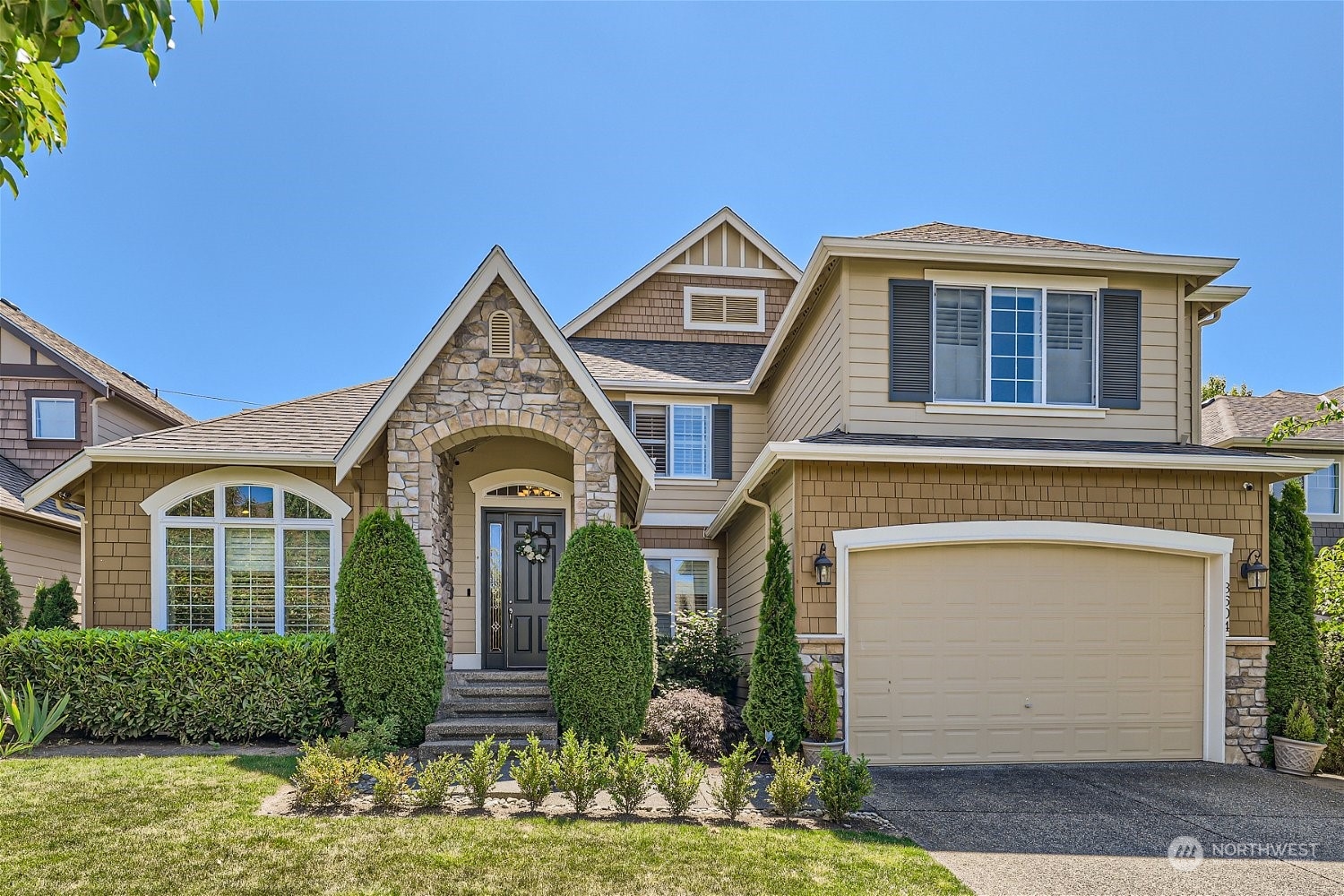 3604 184th Place Southeast Bothell, WA 98012 - Photo 1 of 39 a front view of a house with garden