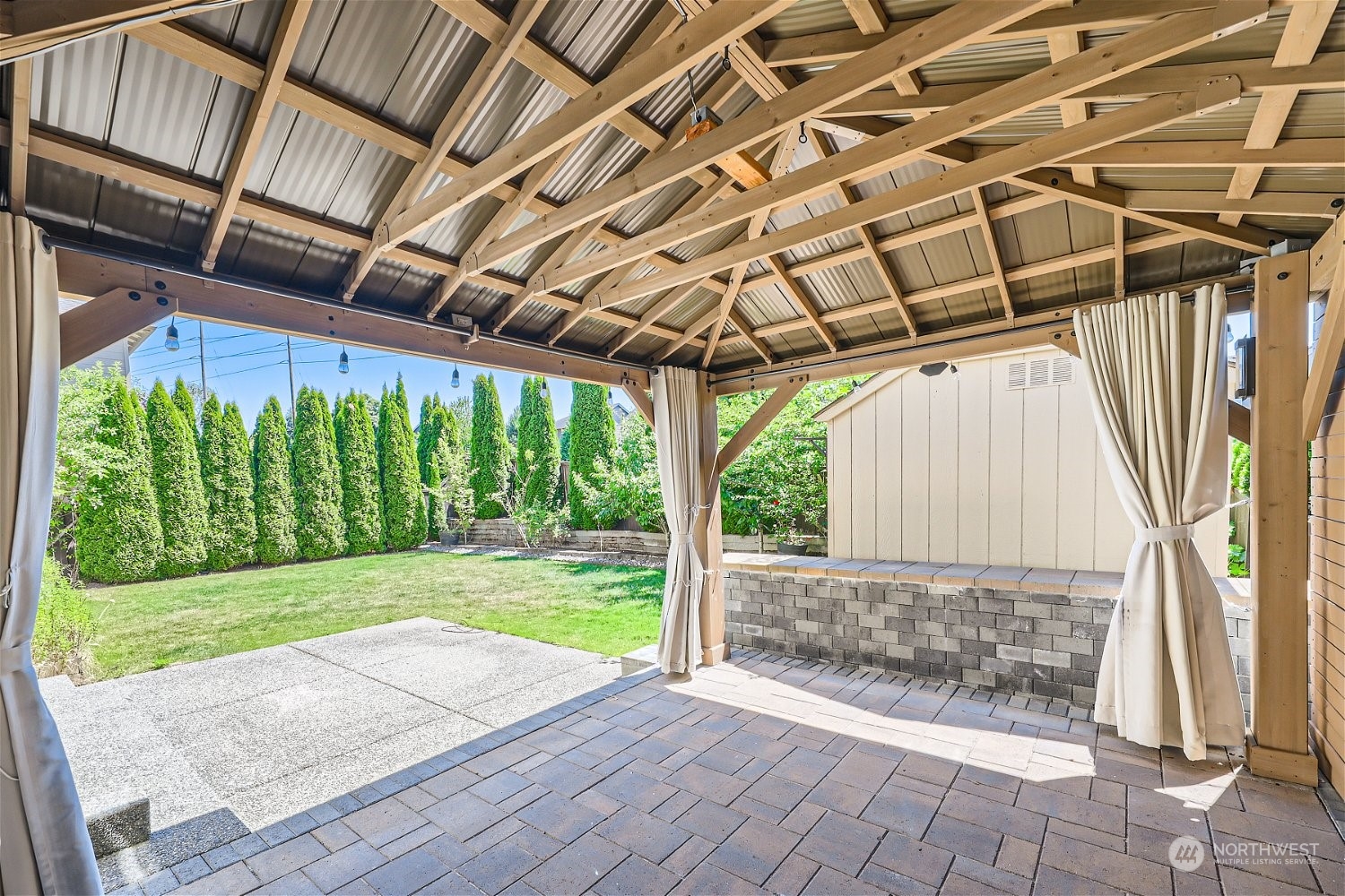 3604 184th Place Southeast Bothell, WA 98012 - Photo 38 of 39 a view of a backyard with wooden floor