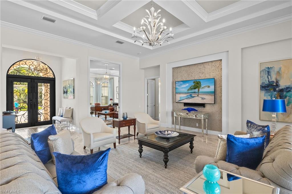 11681 Bald Eagle Way Naples, FL 34120 - Photo 3 of 50 a living room with furniture and a large window