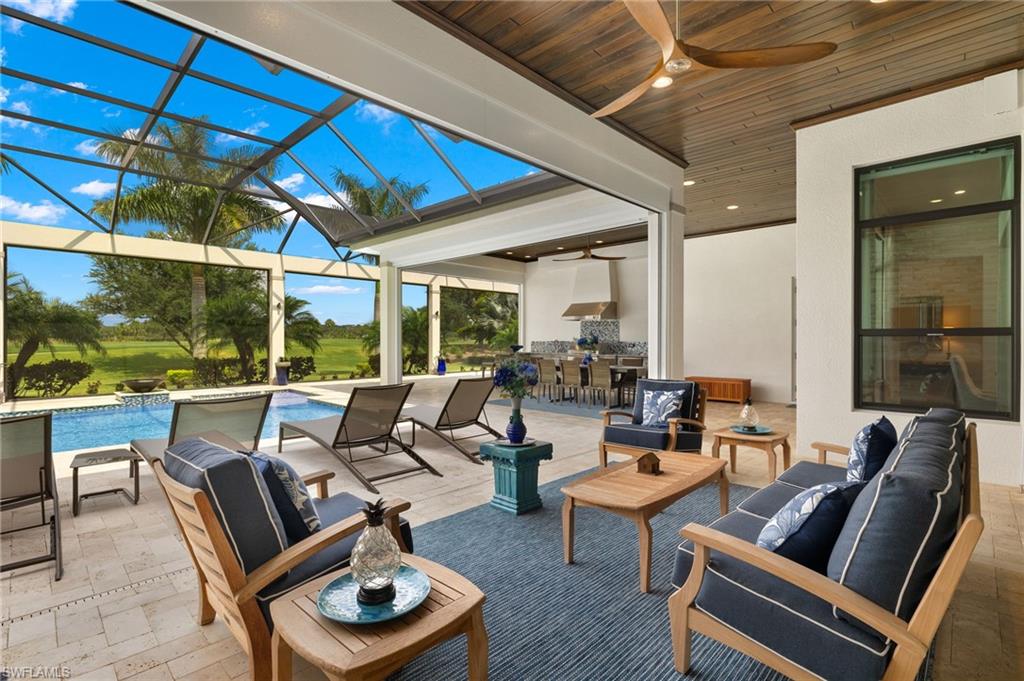 11681 Bald Eagle Way Naples, FL 34120 - Photo 38 of 50 a building outdoor space with patio furniture