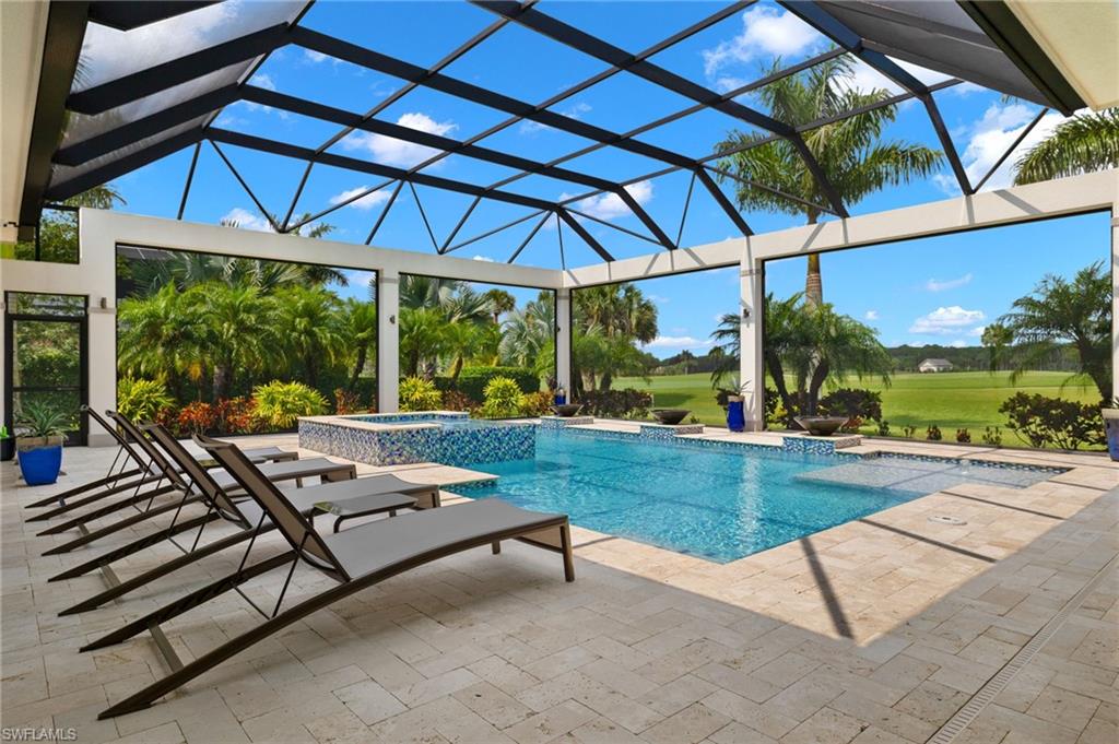 11681 Bald Eagle Way Naples, FL 34120 - Photo 41 of 50 a view of swimming pool with outdoor seating and a patio