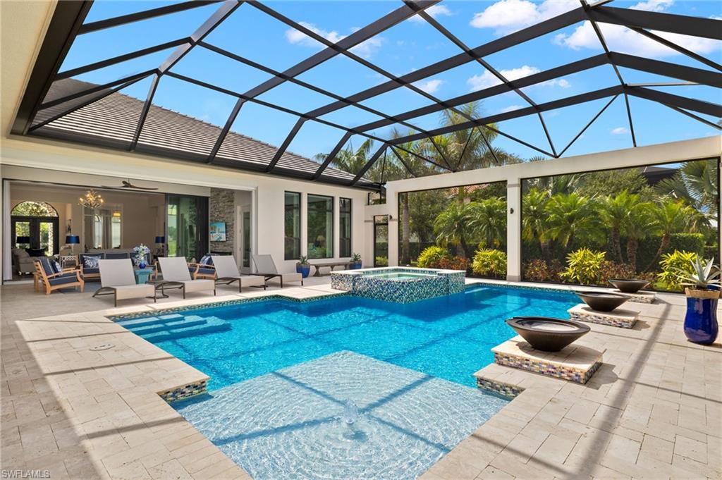 11681 Bald Eagle Way Naples, FL 34120 - Photo 42 of 50 a view of swimming pool with outdoor seating