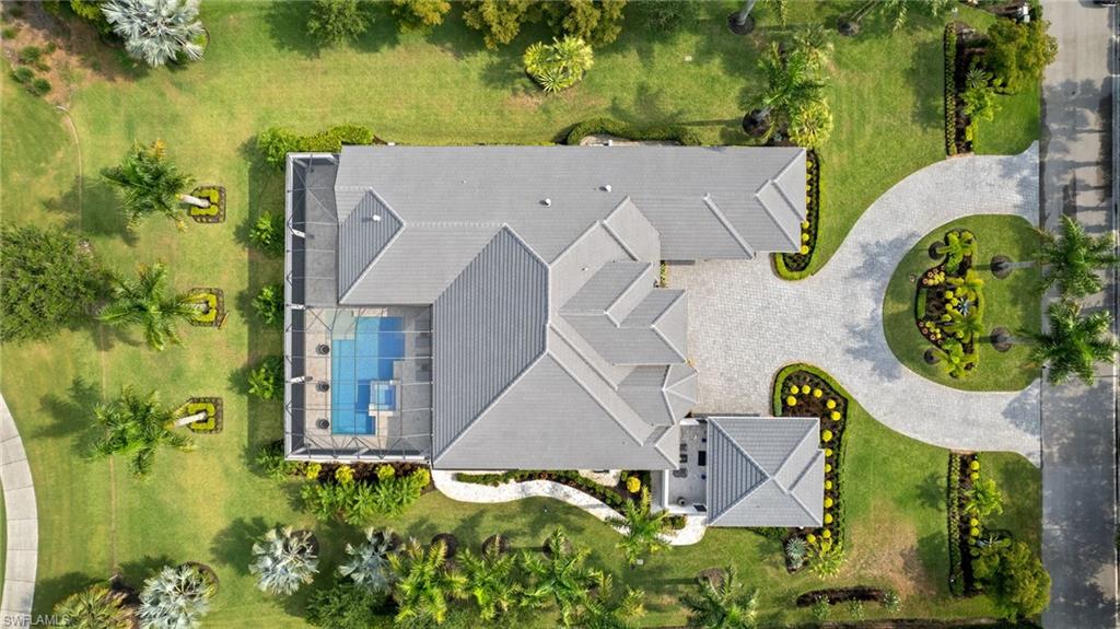 11681 Bald Eagle Way Naples, FL 34120 - Photo 49 of 50 an aerial view of a house with swimming pool and outdoor space