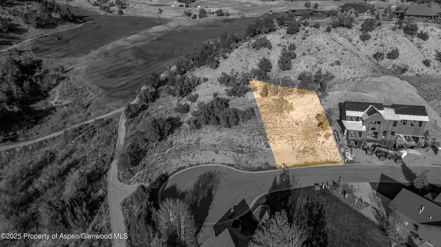 a view of lot of car parked on city street