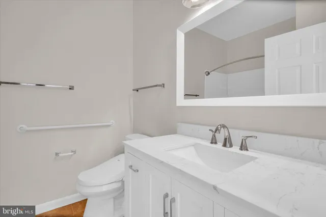 a bathroom with a sink and a toilet