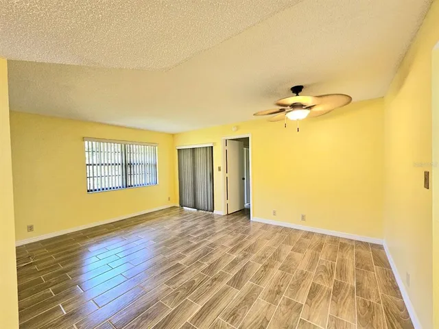 a view of a bathroom with a shower and a sink