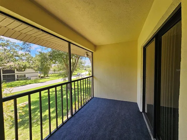 a bathroom with a mirror and a shower
