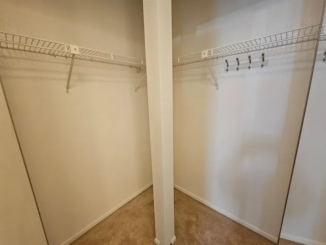 a bathroom with a sink double vanity and a mirror