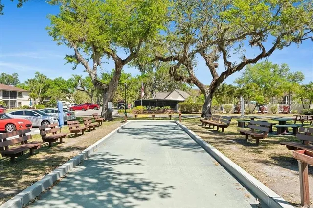 an aerial view of a house with a lake view